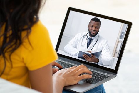 Doctor conducting a video consultation with an international patient through Rawa Health Services.